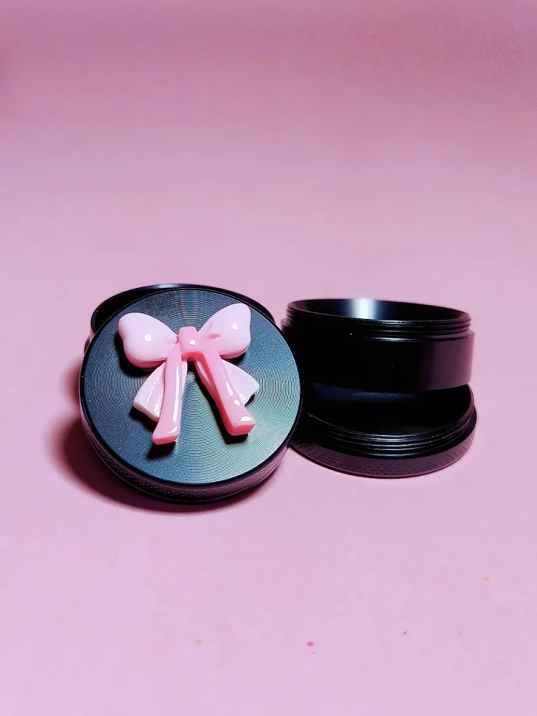 Chic Black Metal Grinder with Sweet Pink Bow